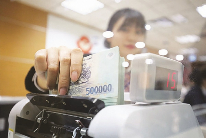 Giảm áp lực nợ xấu, ngân hàng kỳ vọng tăng trưởng lợi nhuận năm 2025 Giảm áp lực nợ xấu, ngân hàng kỳ vọng tăng trưởng lợi nhuận năm 2025