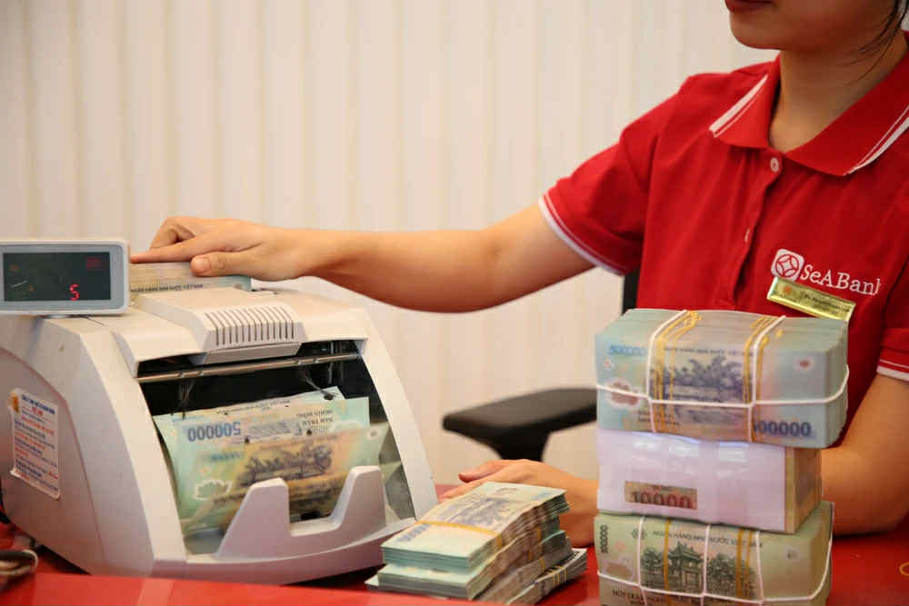 Ngân hàng giảm lãi suất, tăng tín dụng cho doanh nghiệp tư nhân Ngân hàng giảm lãi suất, tăng tín dụng cho doanh nghiệp tư nhân