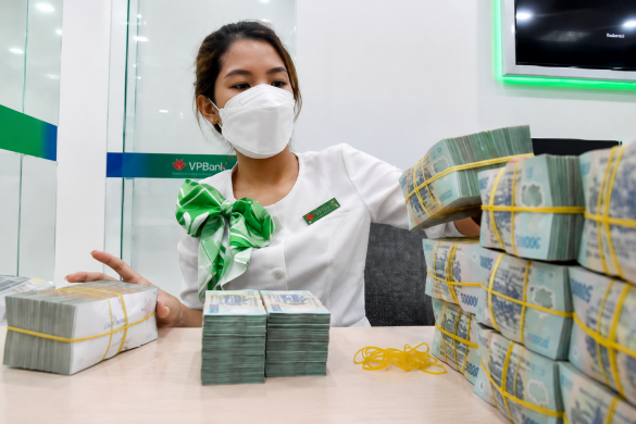 Tăng trưởng tín dụng vượt huy động, áp lực thanh khoản gia tăng