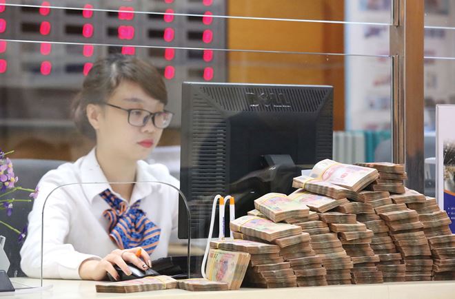 NHNN nới chỉ tiêu tín dụng, dòng vốn rẻ tăng tốc chảy vào sản xuất – kinh doanh NHNN nới chỉ tiêu tín dụng, dòng vốn rẻ tăng tốc chảy vào sản xuất – kinh doanh