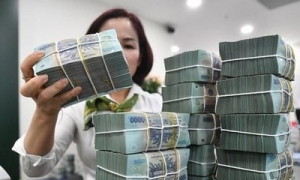 Làm sao ‘rã băng’ để dòng tiền gửi từ nhà băng chảy ra nền kinh tế?