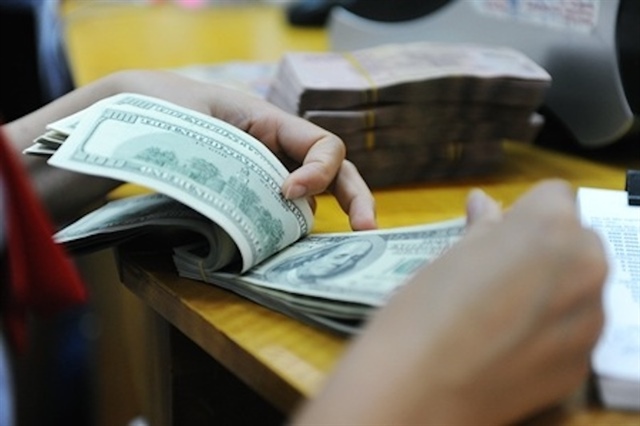 Tăng cung ngoại tệ - Kiềm chế lãi suất | Fili