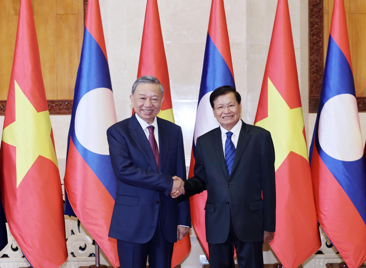“Đòn bẩy” chính sách đầu tư cho Việt Nam và Lào “Đòn bẩy” chính sách đầu tư cho Việt Nam và Lào