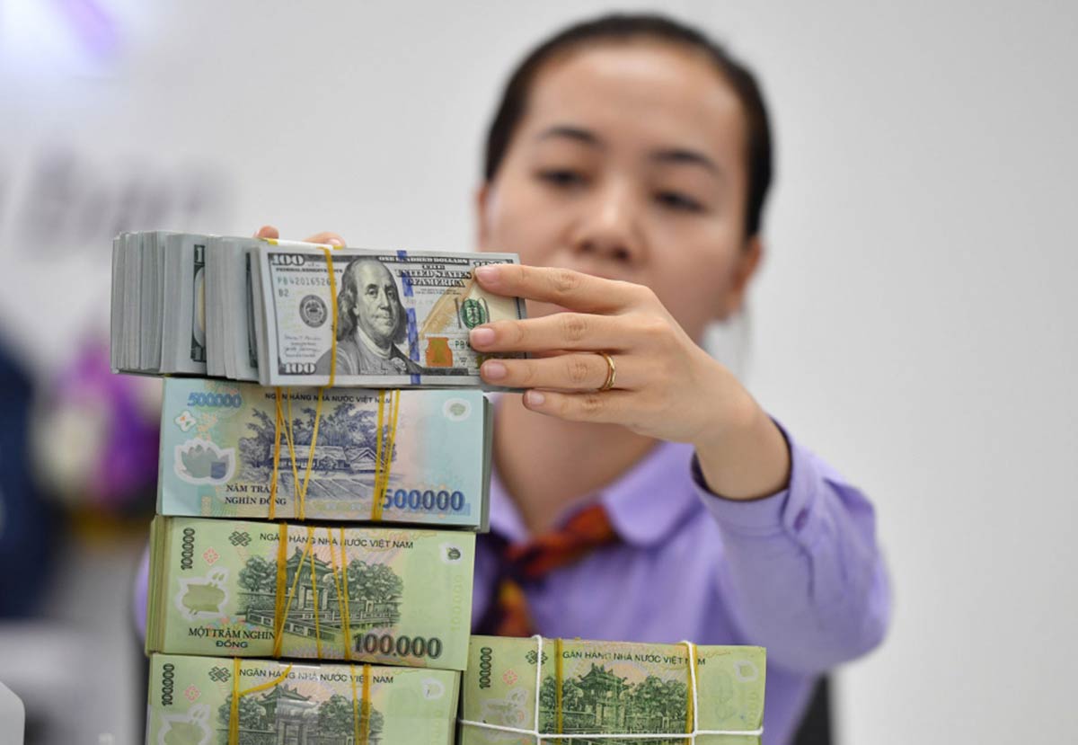 Ứng phó khi tỷ giá USD/VND liên tục tăng cao Ứng phó khi tỷ giá USD/VND liên tục tăng cao